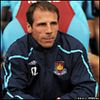 West Ham 3 v 1 Newcastle&nbsp;:&nbsp;New Hammers boss Gianfranco Zola settles himself in the dugout as he prepares to take charge of his first game