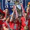 Manchester United seal their third successive Premier League title&nbsp;:&nbsp;The triumphant players celebrate with the trophy after Manchester United seal their third successive Premier League title in front of the rapturous Old Trafford faithful, equalling Liverpool's record of 18 top-flight crowns