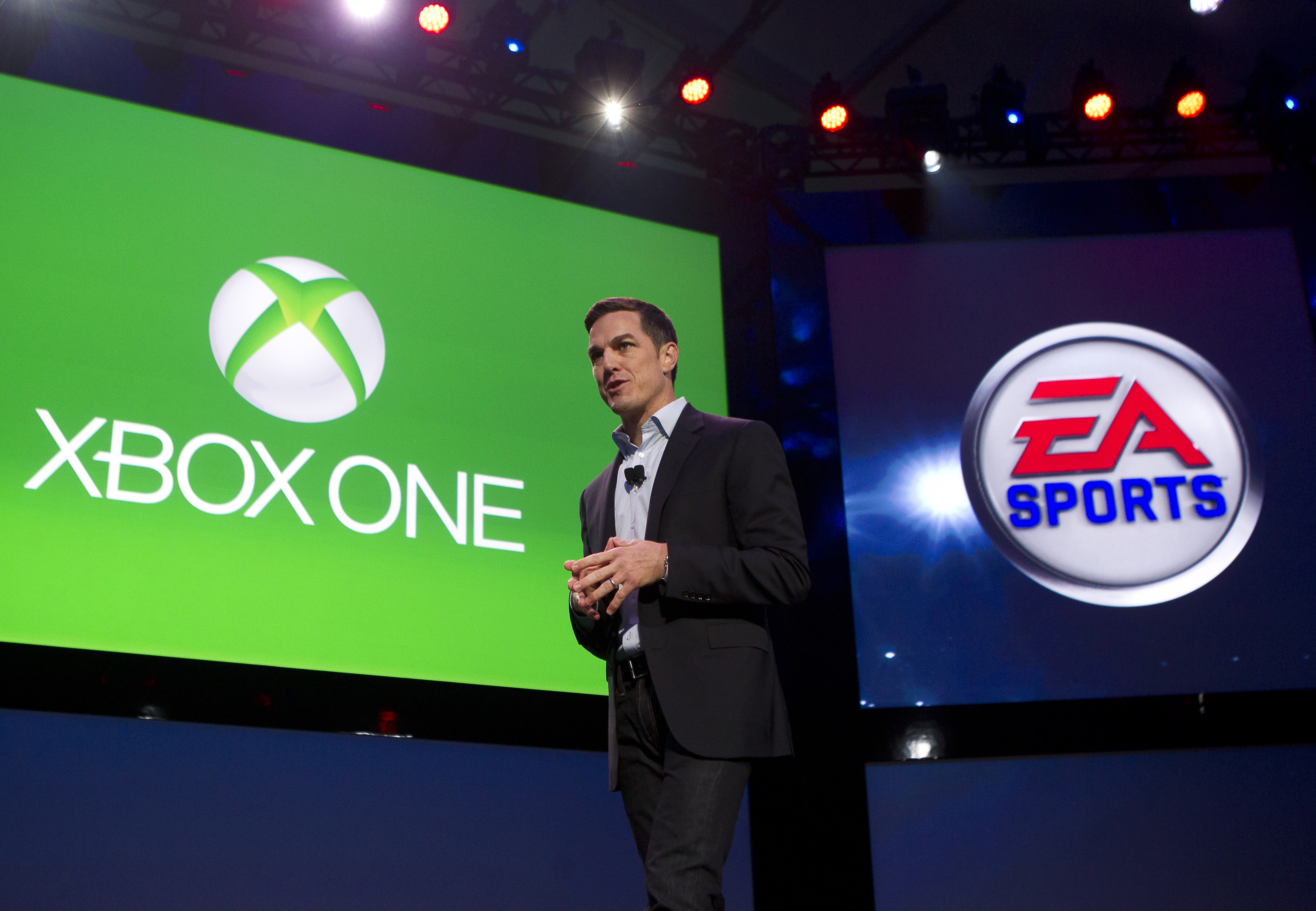 Andrew Wilson, Executive Vice President at EA Sports, unveils a new lineup of EA Sports game coming to Xbox One during Xbox reveal event, on Tuesday, May 21, 2013, in Redmond, Wash. (Photo by Stephen Brashear/Invision for Microsoft/AP Images)